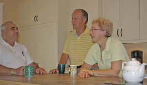 Charles chats with two happy customers